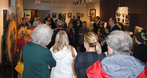 Friends and family gather in the Harry L. Jackson Gallery to commemorate the life of David Garvin.
