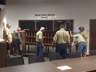 Six employees moved the DLSC manuscripts card cabinet to Gatton Academy yesterday.
